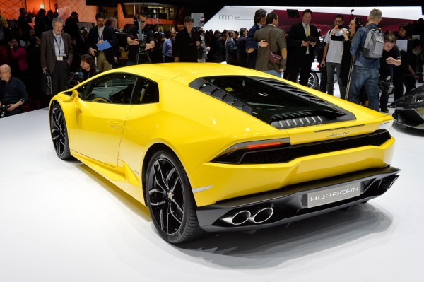 Car wallpaper: Lamborghini Huracan LP 610-4 on car exhibition stand (yellow) rear left view car wallpaper Lamborghini Huracán LP 610-4: 21 Car Wallpapers car wallpaper lamborghini huracan lp 610 4 wallpaper background yellow rear left view on exhibition